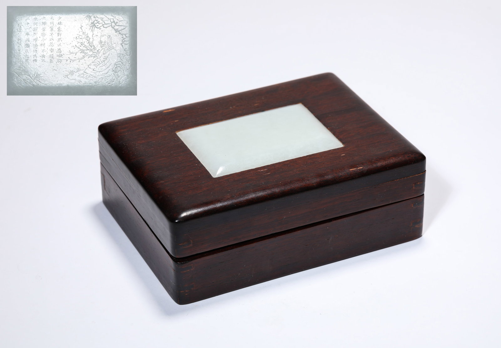 A WOOD AND JADE-INLAID COVERED BOX: A WOOD AND JADE-INLAID COVERED BOX Description: Dimensions: Length: 15.3 cm x Width: 11.4 cm x Height: 5.5 cm. All measurements are approximate.