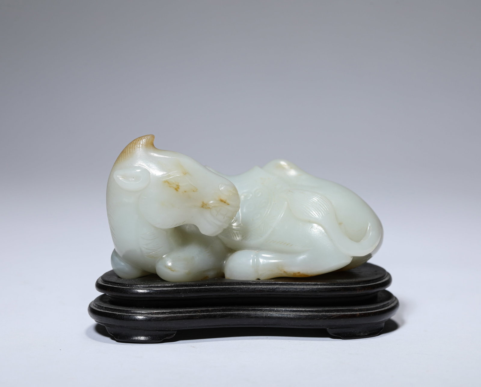 A JADE CAMEL: A JADE CAMEL Description: Dimensions: Length: 8.3 cm x Width: 4.8 cm x Height: 4.5 cm. All measurements are approximate.