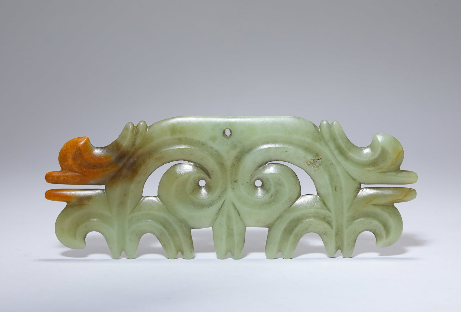 A JADE ‘CLOUD AND HOOK’ PENDANT (1 of 5)