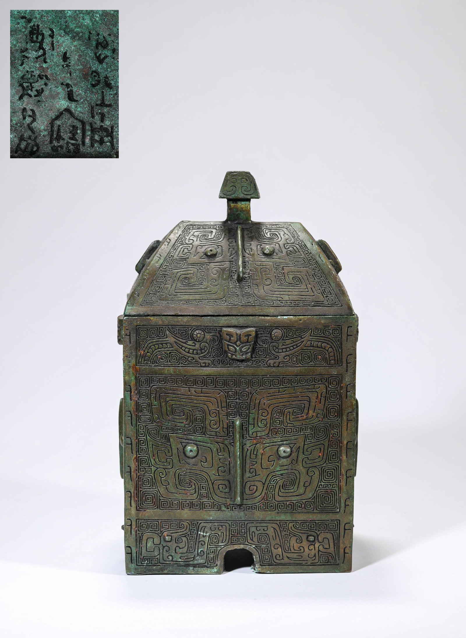 A BRONZE ‘DING’-FORM ‘FANGYI’ RITUAL VESSEL (1 of 6)