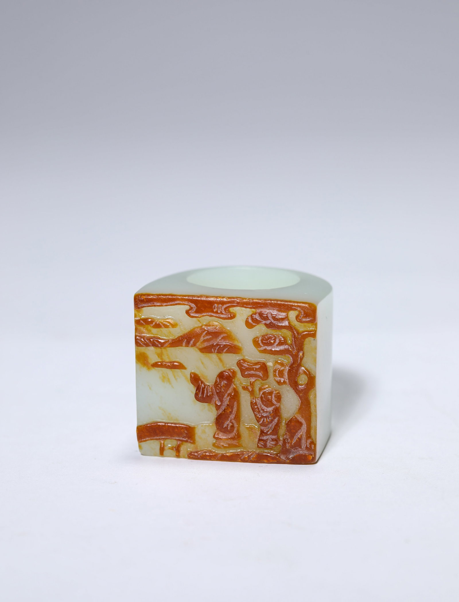 A JADE ‘NARRATIVE SCENE’ ARCHER’S RING: A JADE ‘NARRATIVE SCENE’ ARCHER’S RING Description: Dimensions: Length: 3.7 cm x Width: 3.5 cm x Height: 3.2 cm. All measurements are approximate.