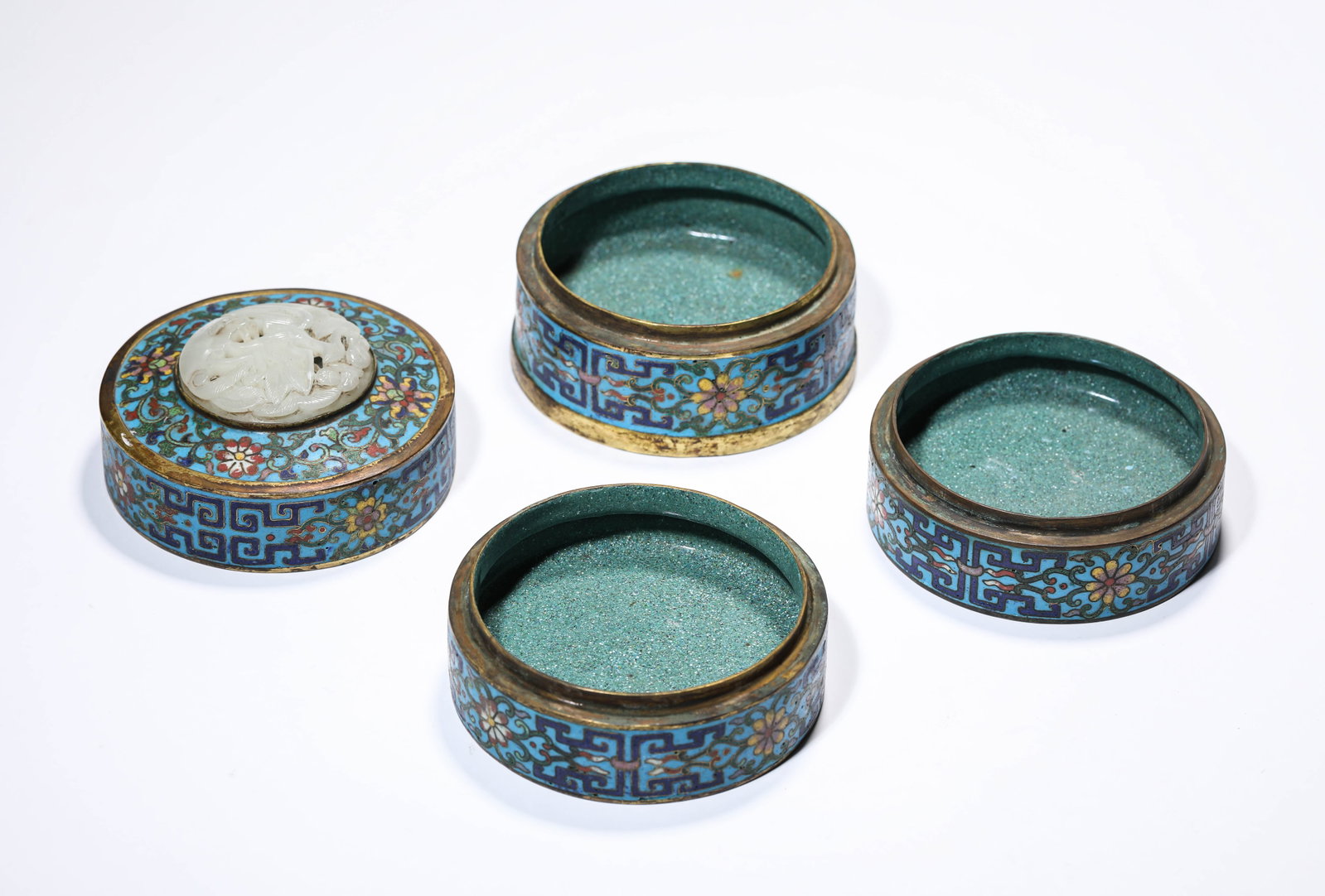 A CLOISONNé ENAMEL AND JADE-INLAID ‘FLORAL’ COVERED BOX: A CLOISONNé ENAMEL AND JADE-INLAID ‘FLORAL’ COVERED BOX Description: Dimensions: Weight: 1413 g. Width: 10.1 cm x Height: 13.5 cm. All measurements are approximate.