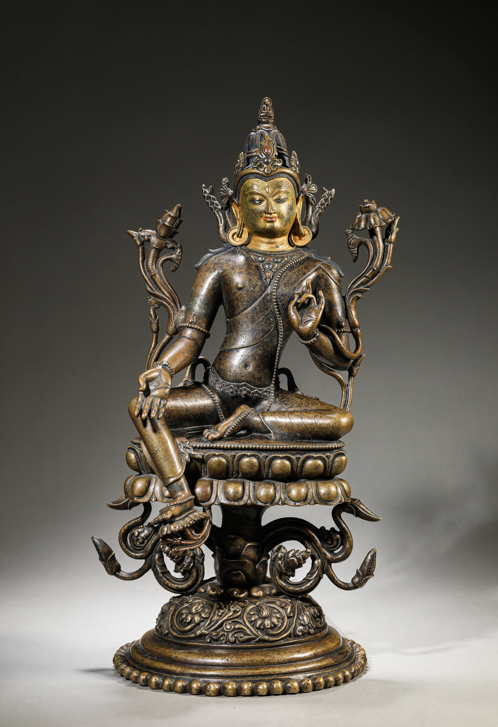 A TIBETAN PALA-STYLE ALLOY BRONZE AND SILVER-INLAID FIGURE OF GREEN TARA: A TIBETAN PALA-STYLE ALLOY BRONZE AND SILVER-INLAID FIGURE OF GREEN TARA Description: Dimensions: Weight: 9150 g. Length: 25.5 cm x Width: 23.3 cm x Height: 50.8 cm. All measurements are approximate.