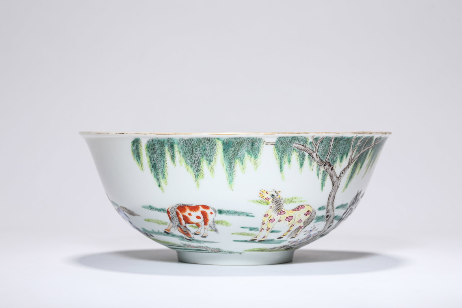 A FAMILLE-ROSE ‘FIVE HORSES’ BOWL: A FAMILLE-ROSE ‘FIVE HORSES’ BOWL Description: Dimensions: Width: 19 cm x Height: 7.8 cm. All measurements are approximate.