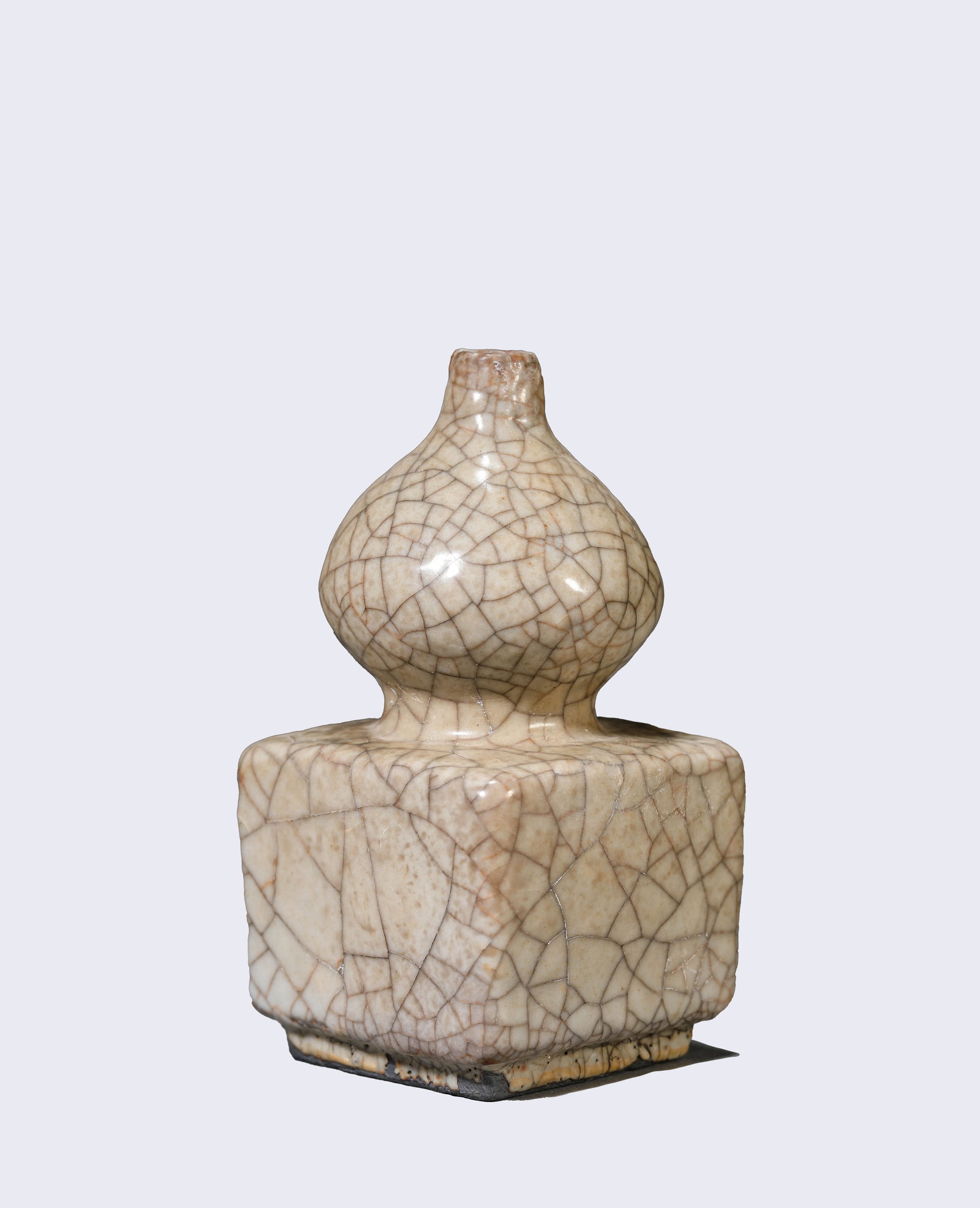 A GE-TYPE 'SQUARE VASE WITH CIRCULAR MOUTH': A GE-TYPE 'SQUARE VASE WITH CIRCULAR MOUTH' Description: Dimensions: Width: 6.5 cm x Height: 11.8 cm. All measurements are approximate.