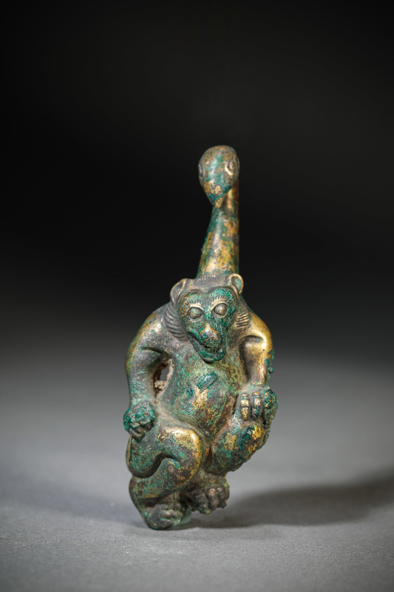 A SILVER ‘BEAR-FORM’ BELT HOOK: A SILVER ‘BEAR-FORM’ BELT HOOK Description: Dimensions: Weight: 182 g. Length: 9.5 cm x Width: 3.9 cm x Height: 2.5 cm. All measurements are approximate.