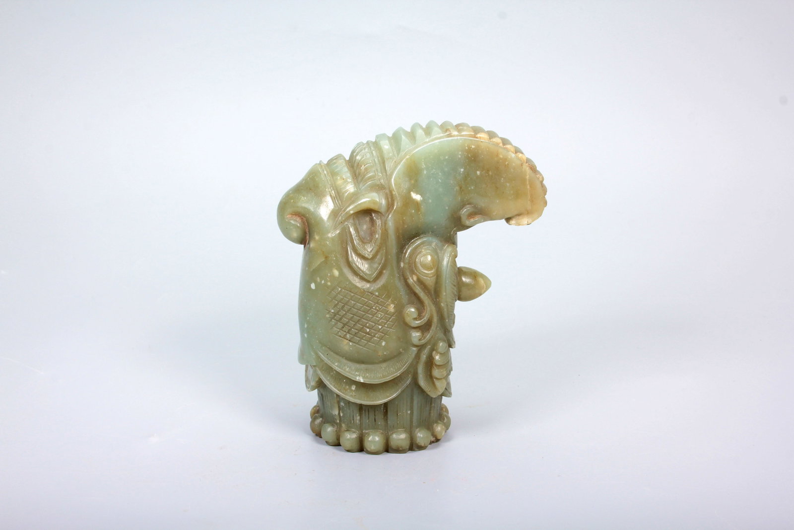 A HETIAN JADE DRAGON HEAD: A HETIAN JADE DRAGON HEAD H:12.2CM,L:5.6CM,W:9.9CM