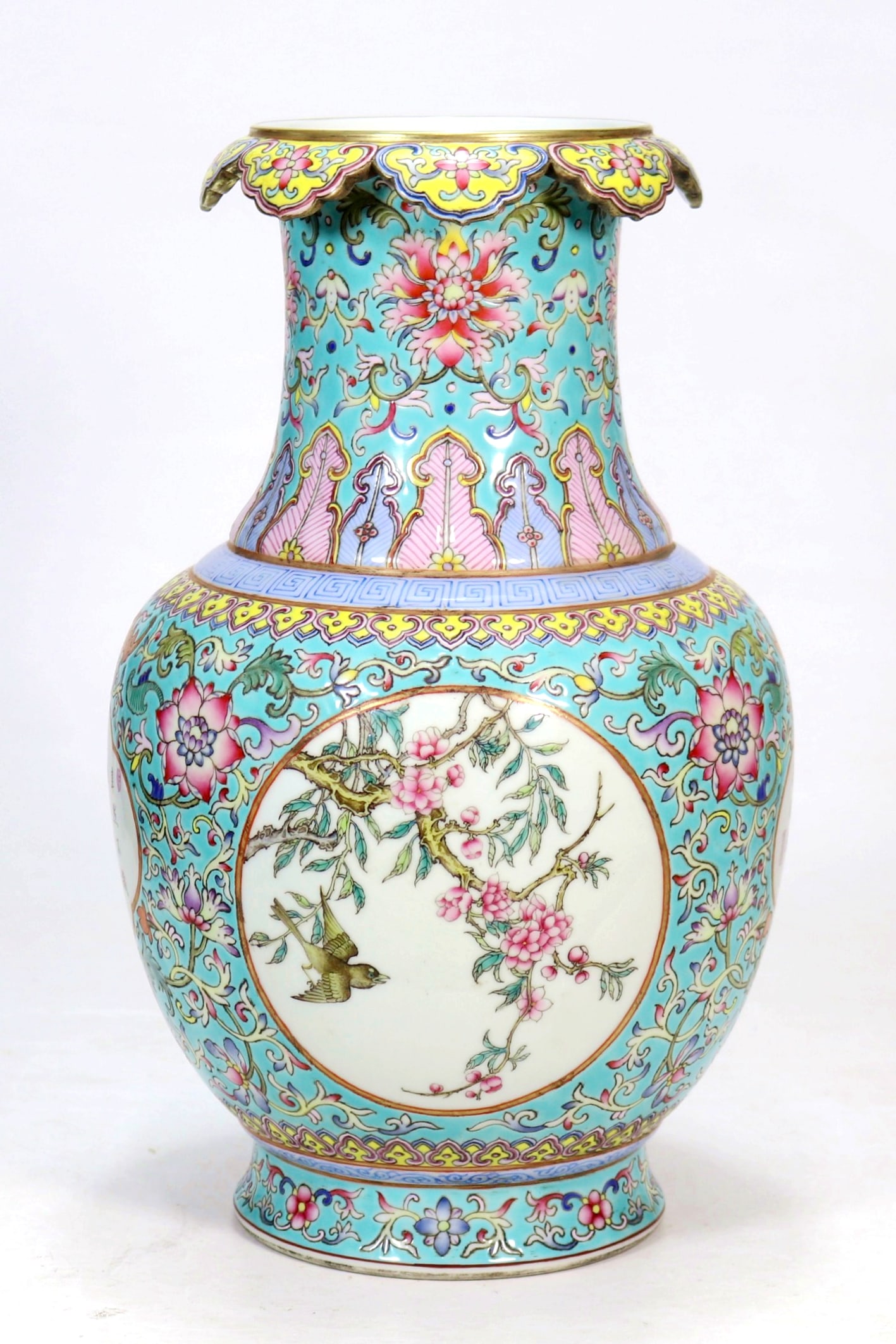 A TURQUOISE GROUND INTERLOCKING FLORAL OPENWORK BIRD AND POEM LOTUS MOUTH VASE: A TURQUOISE GROUND INTERLOCKING FLORAL OPENWORK BIRD AND POEM LOTUS MOUTH VASE H:32CM,D:11CM