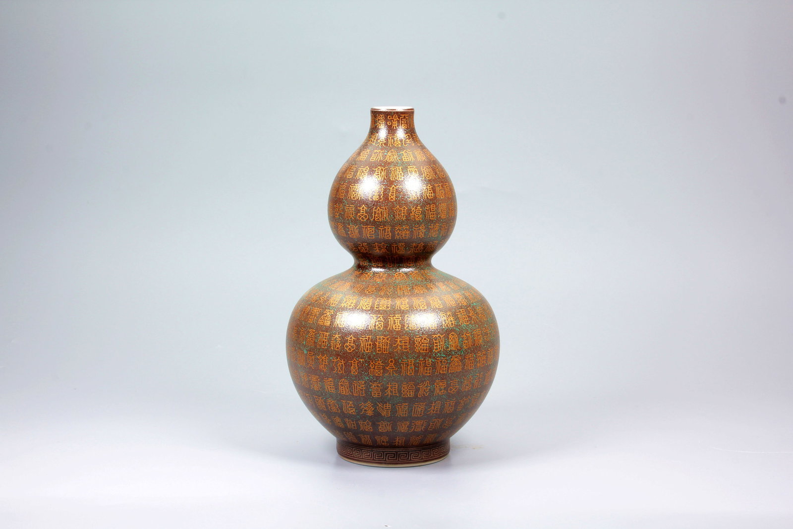 A ARCHAISTIC BRONZE GLAZED GOLD TRACED TEN THOUSAND AUSPICIOUSNESS GOURD VASE: A ARCHAISTIC BRONZE GLAZED GOLD TRACED TEN THOUSAND AUSPICIOUSNESS GOURD VASE H:19.2CM,D:11.6CM