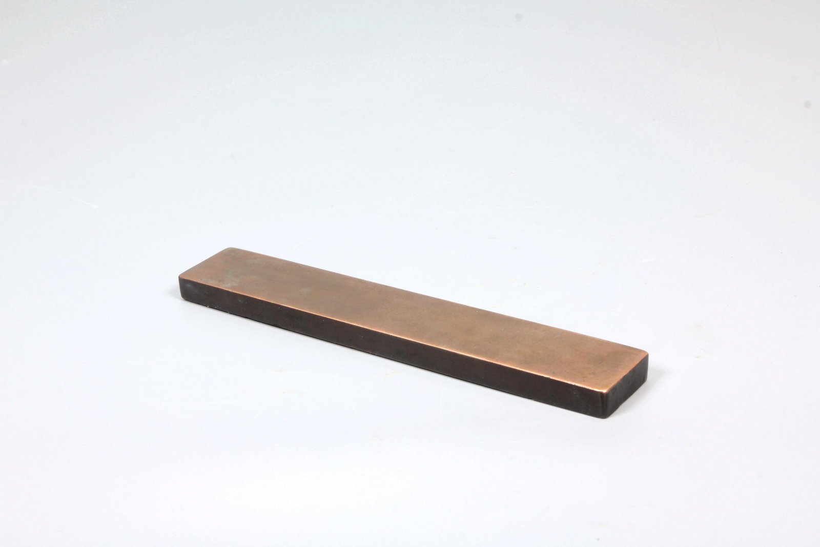 A BRONZE POEM PAPERWEIGHT - 4