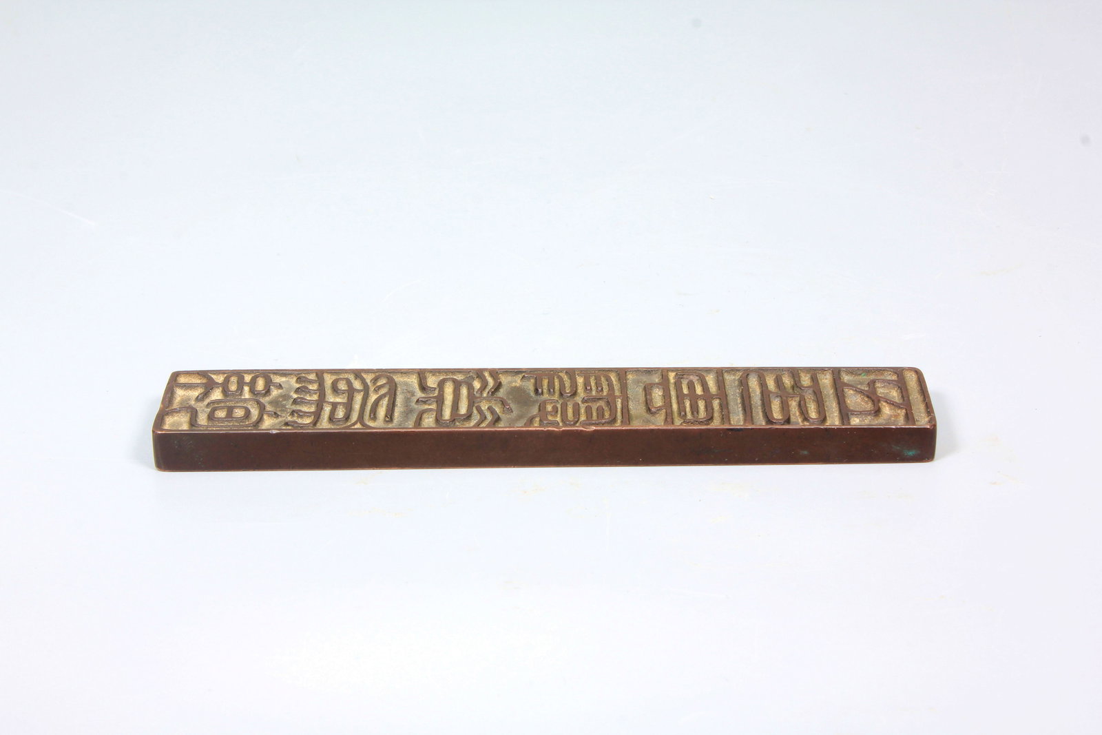 A BRONZE POEM PAPERWEIGHT - 6
