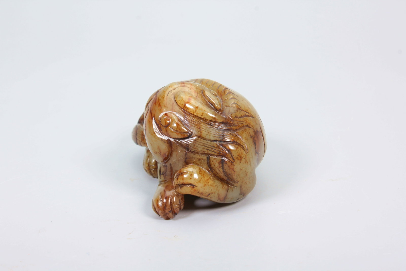 A HETIAN JADE AUSPICIOUS BEAST ORNAMENT - 2
