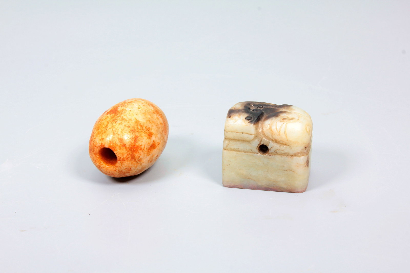 A SET OF ANCIENT JADE ORNAMENT: A SET OF ANCIENT JADE ORNAMENT 1.2.5*2.9*2.2CM;2.L:3.3CM,D:2.5CM