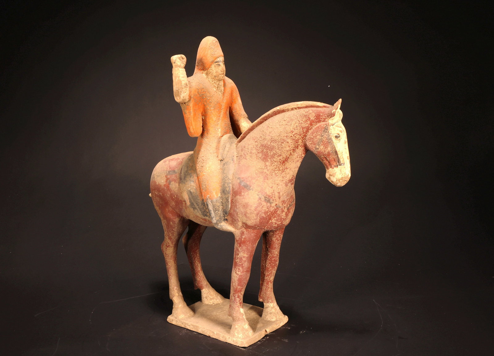 A TANG DYNASTY SANCAI RIDING FIGURE: A TANG DYNASTY SANCAI RIDING FIGURE H:32CM,W:9CM