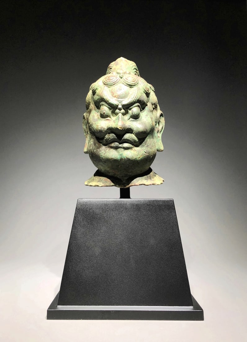 A BRONZE HEAD OF VAISRAVANA: A BRONZE HEAD OF VAISRAVANA D:20CM,H:57CM,13500G