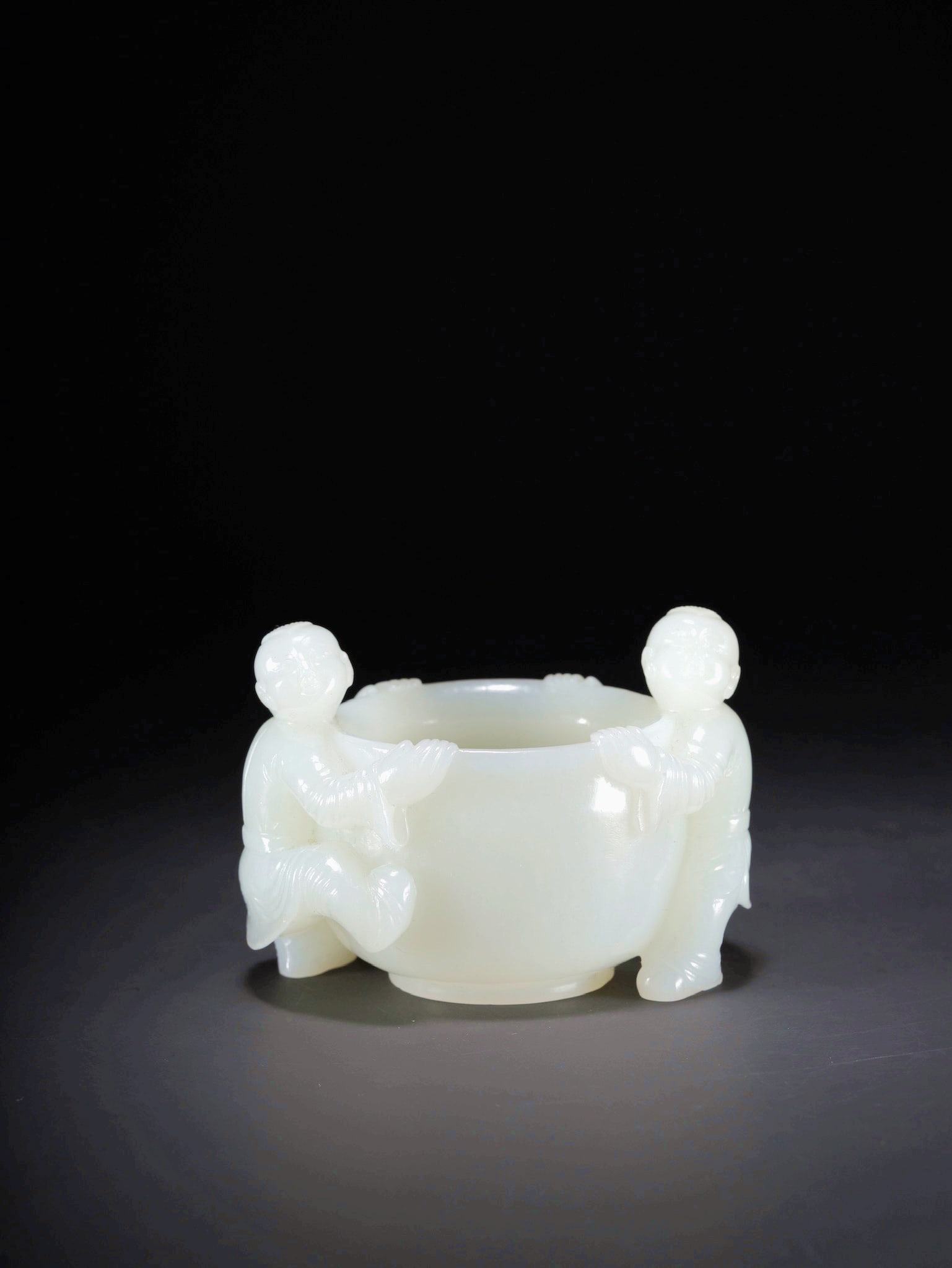 A HETIAN JADE DOUBLE-CHILD EAR CUP (1 of 9)