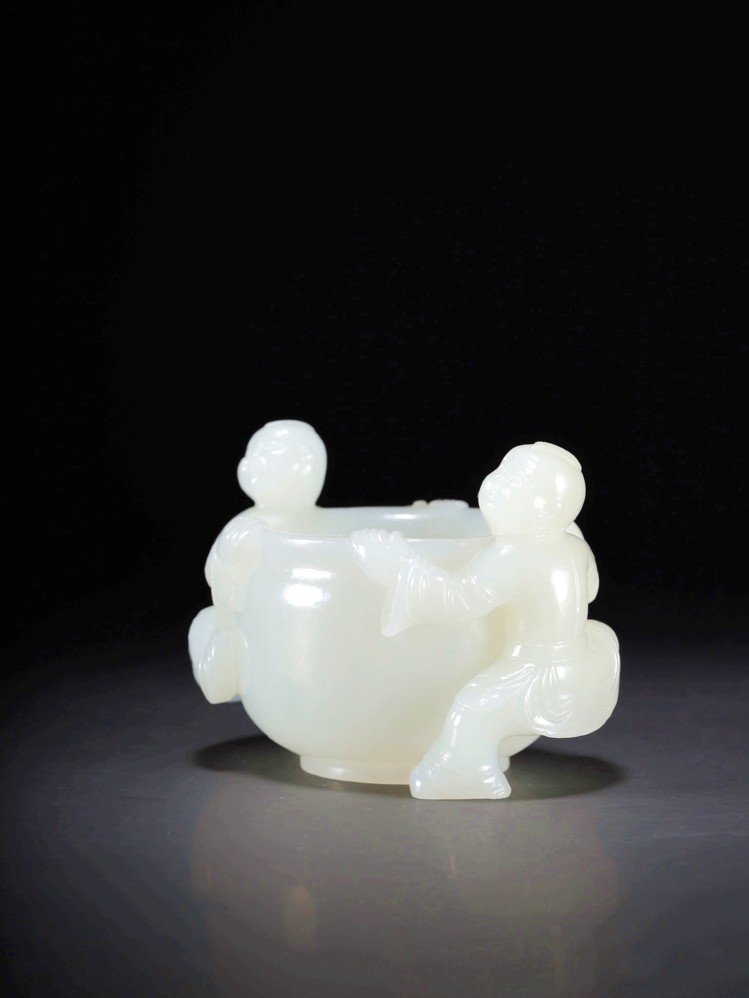 A HETIAN JADE DOUBLE-CHILD EAR CUP - 2