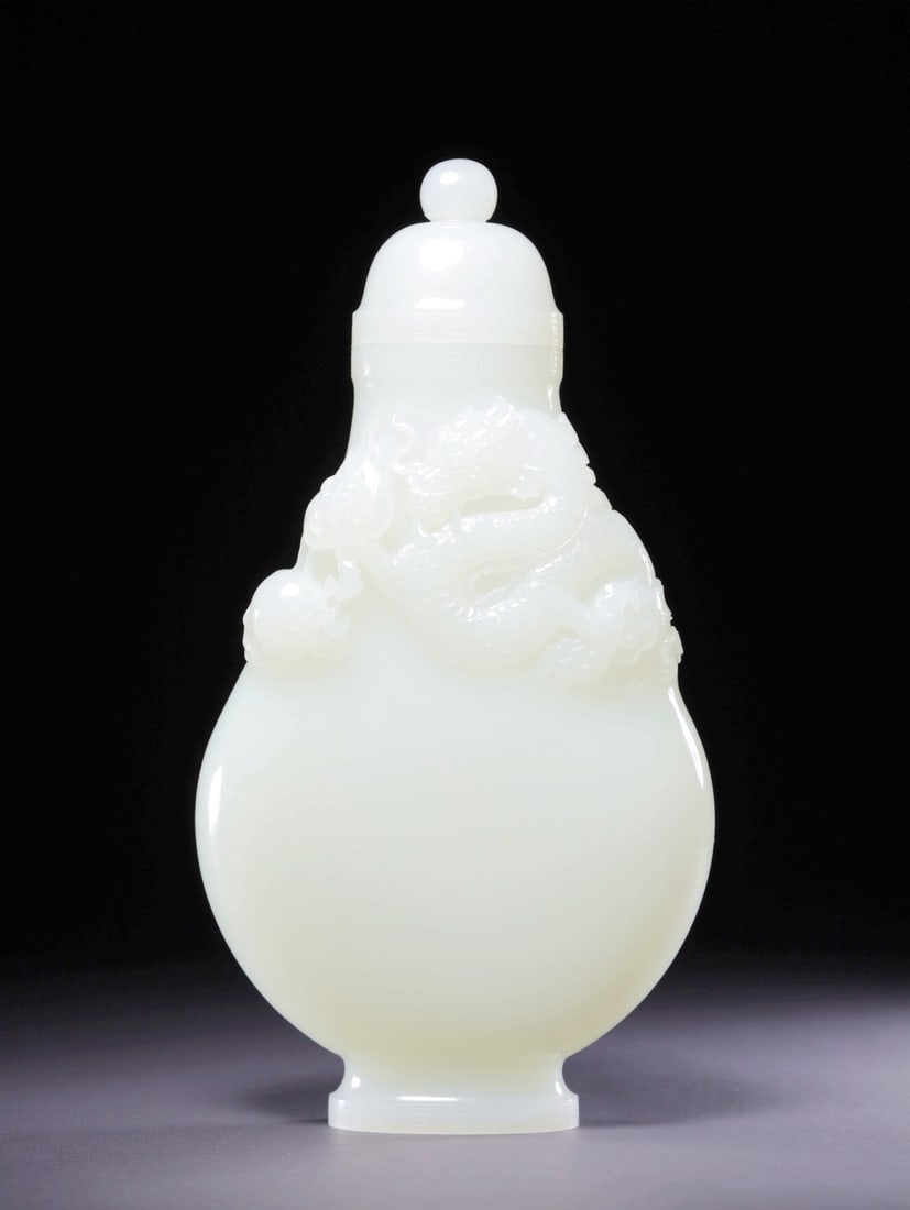 A HETIAN WHITE JADE DRAGON PATTERN VASE: A HETIAN WHITE JADE DRAGON PATTERN VASE 18.2*9.8*4.2CM