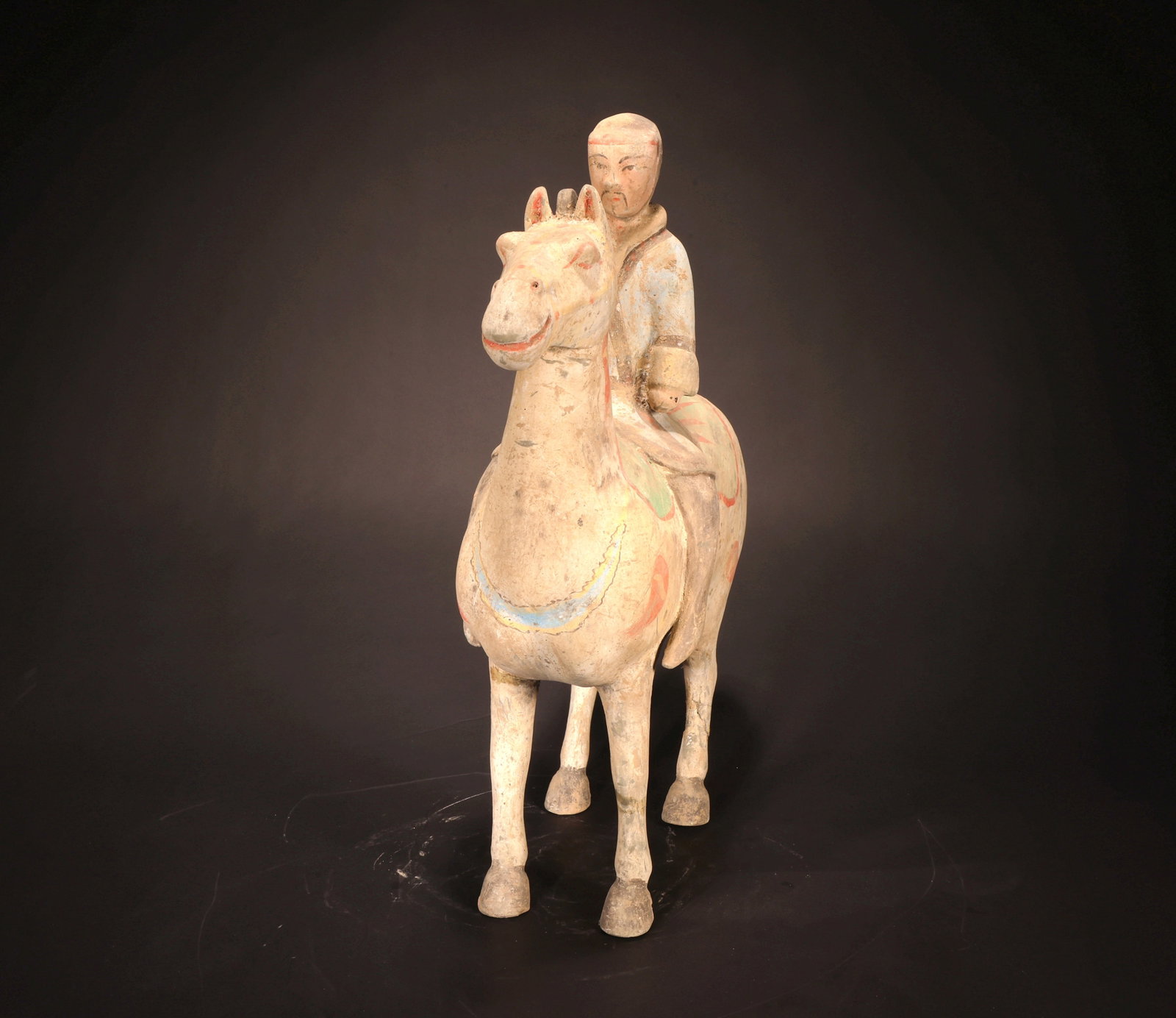 A PAINTED WARRIOR RIDING A HORSE - 3