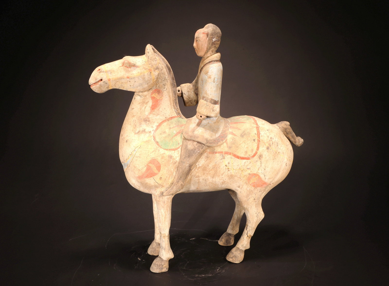 A PAINTED WARRIOR RIDING A HORSE - 4