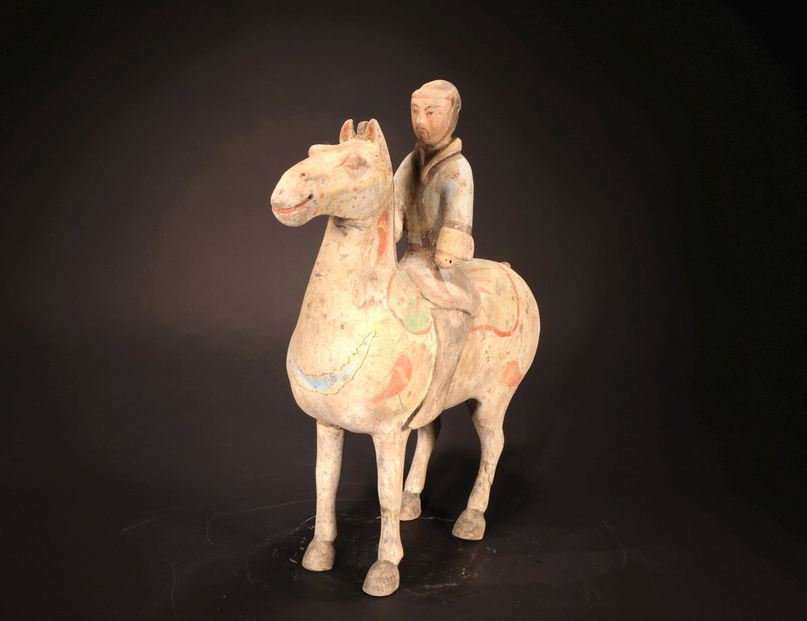 A PAINTED WARRIOR RIDING A HORSE - 5