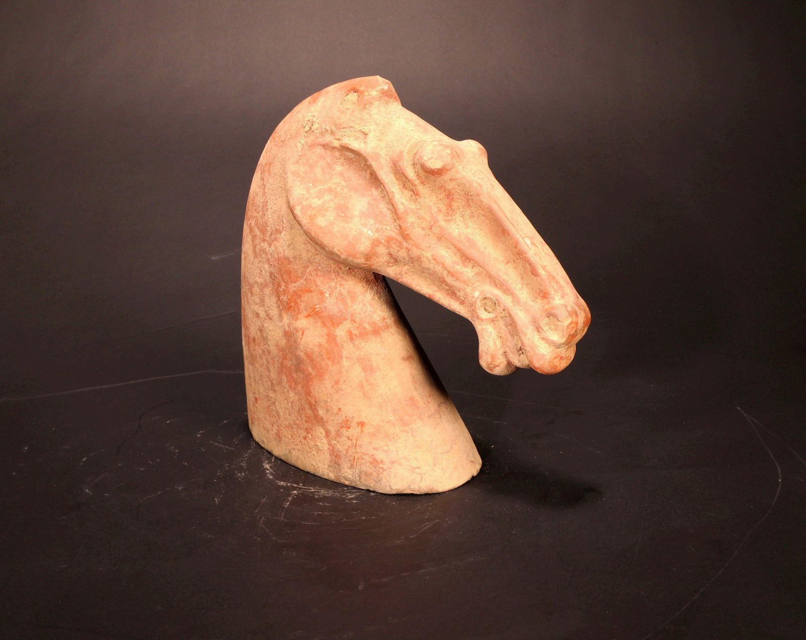 A RED POTTERY HORSE HEAD - 3