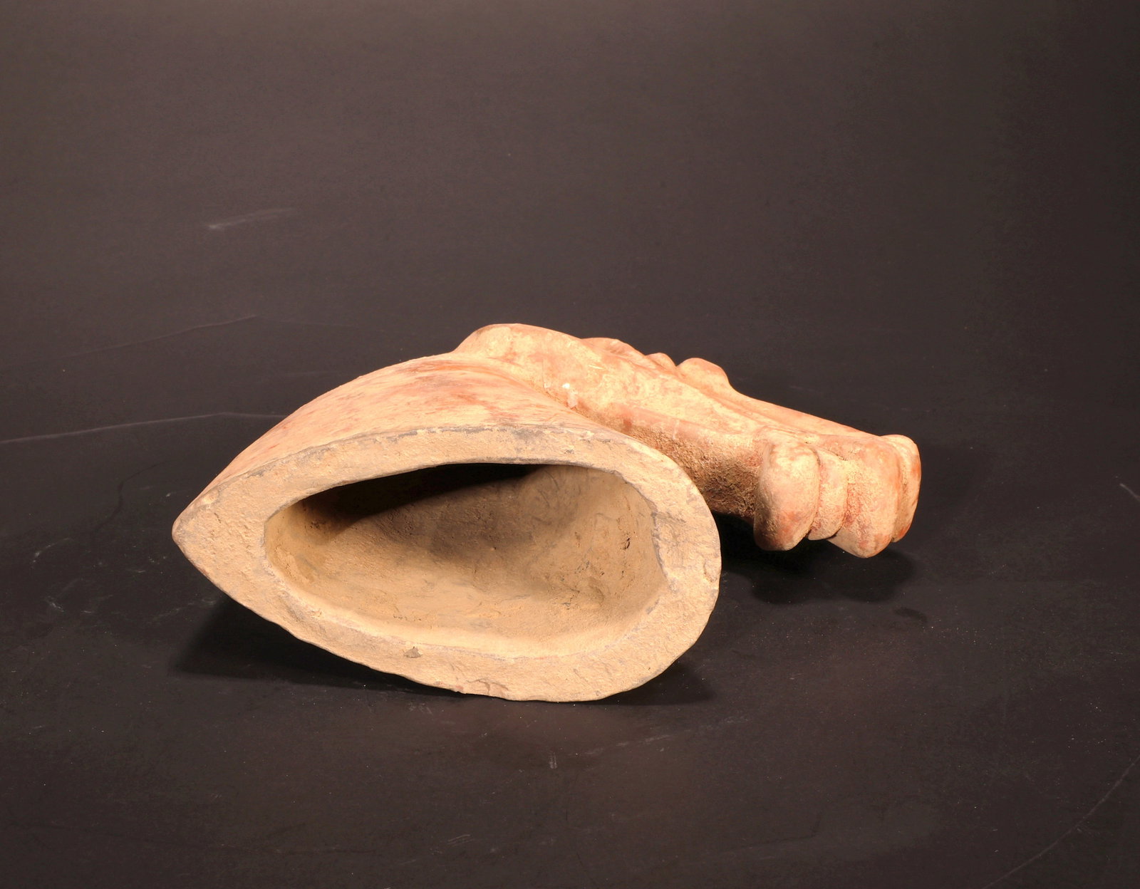 A RED POTTERY HORSE HEAD - 4