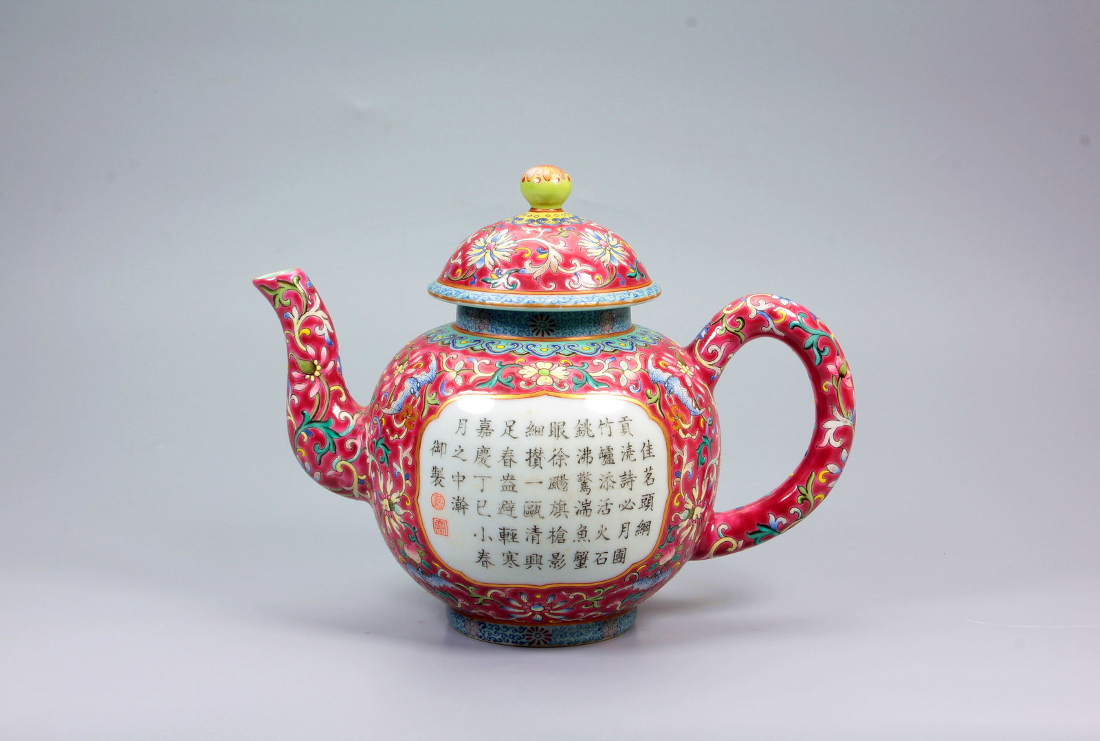 A CARMINE GROUND FAMILLE ROSE FLOWER OPENWORK INSCRIBED POEM TEAPOT (1 of 12)