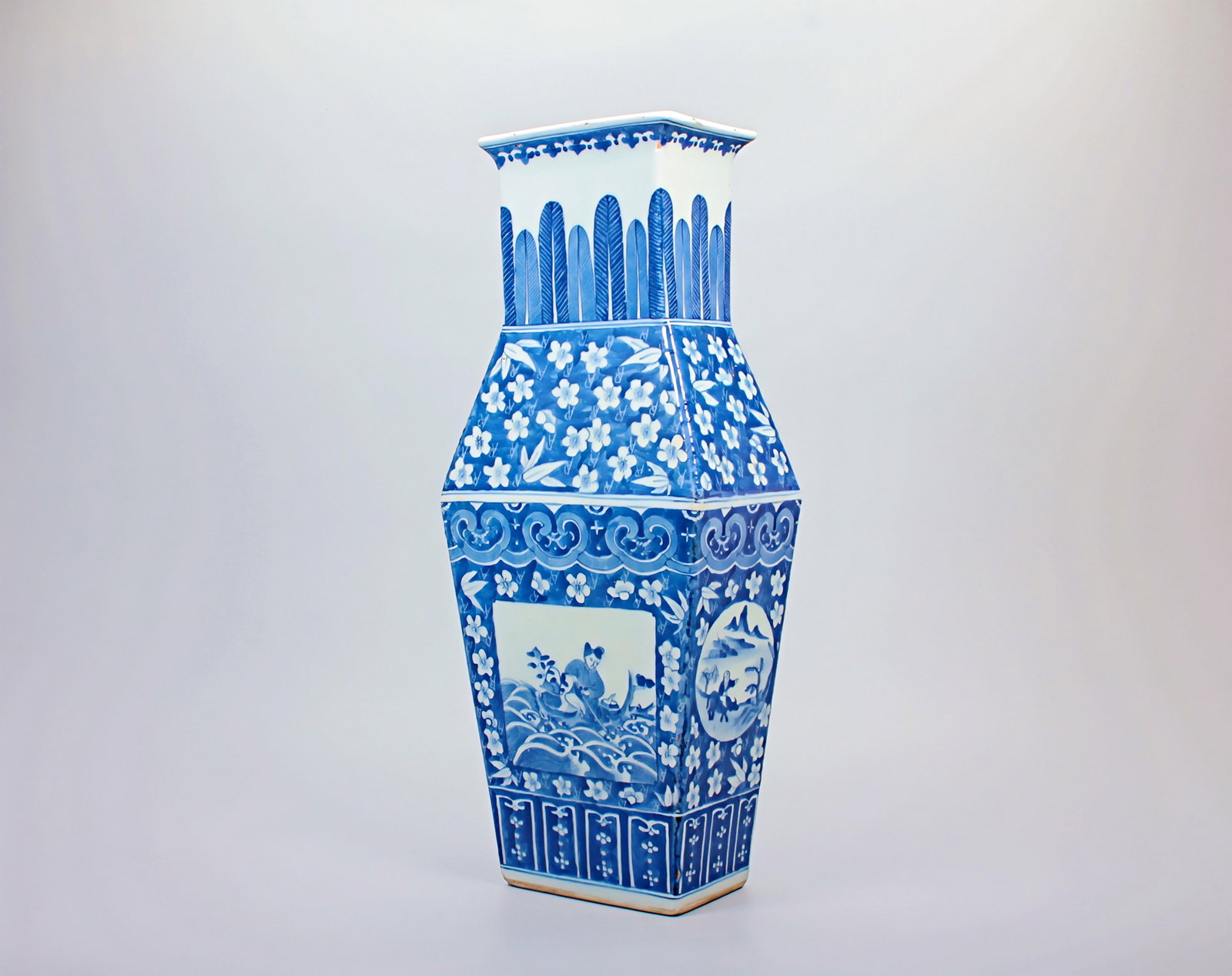 A BLUE AND WHITE PRUNUS SNOWFLAKE OPENWORK LANDSCAPE FIGURE SQUARE VASE: A BLUE AND WHITE PRUNUS SNOWFLAKE OPENWORK LANDSCAPE FIGURE SQUARE VASE H:43.3CM,L:11.4CM,W:18CM