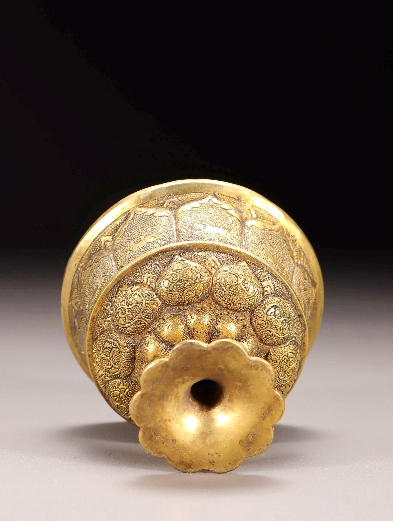 A GILT BRONZE CHASED HIGH STEM CUP - 9