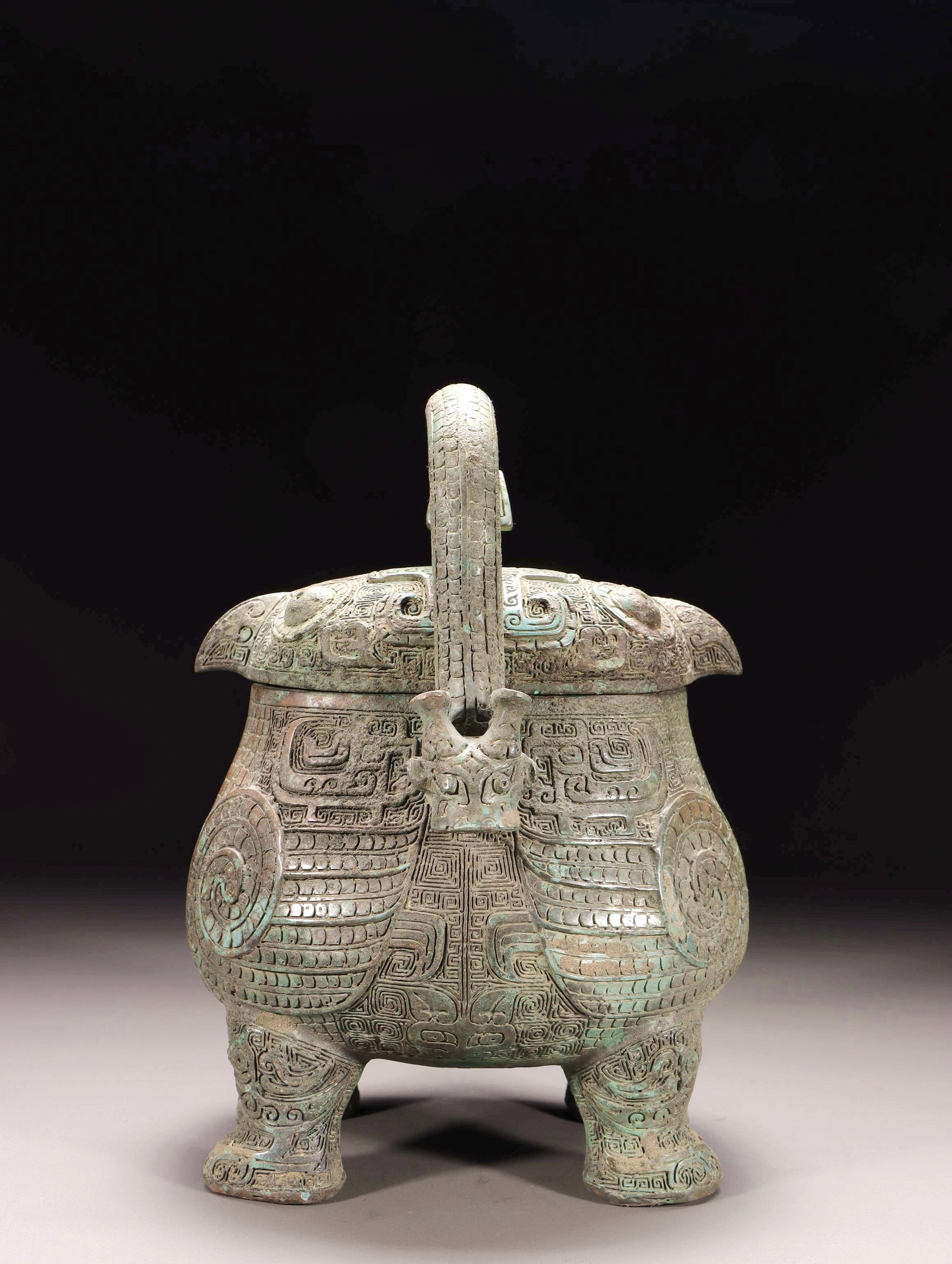 A BRONZE BIRD-SHAPED YOU VESSEL WITH LOOP HANDLE - 3