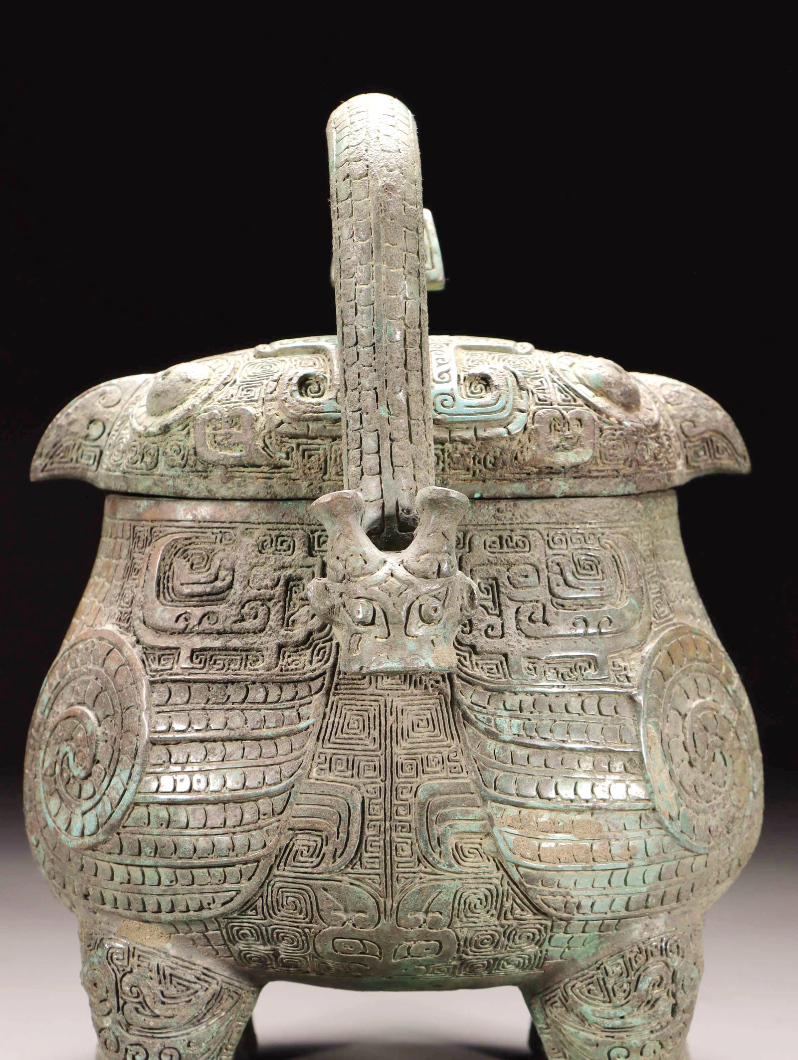 A BRONZE BIRD-SHAPED YOU VESSEL WITH LOOP HANDLE - 4