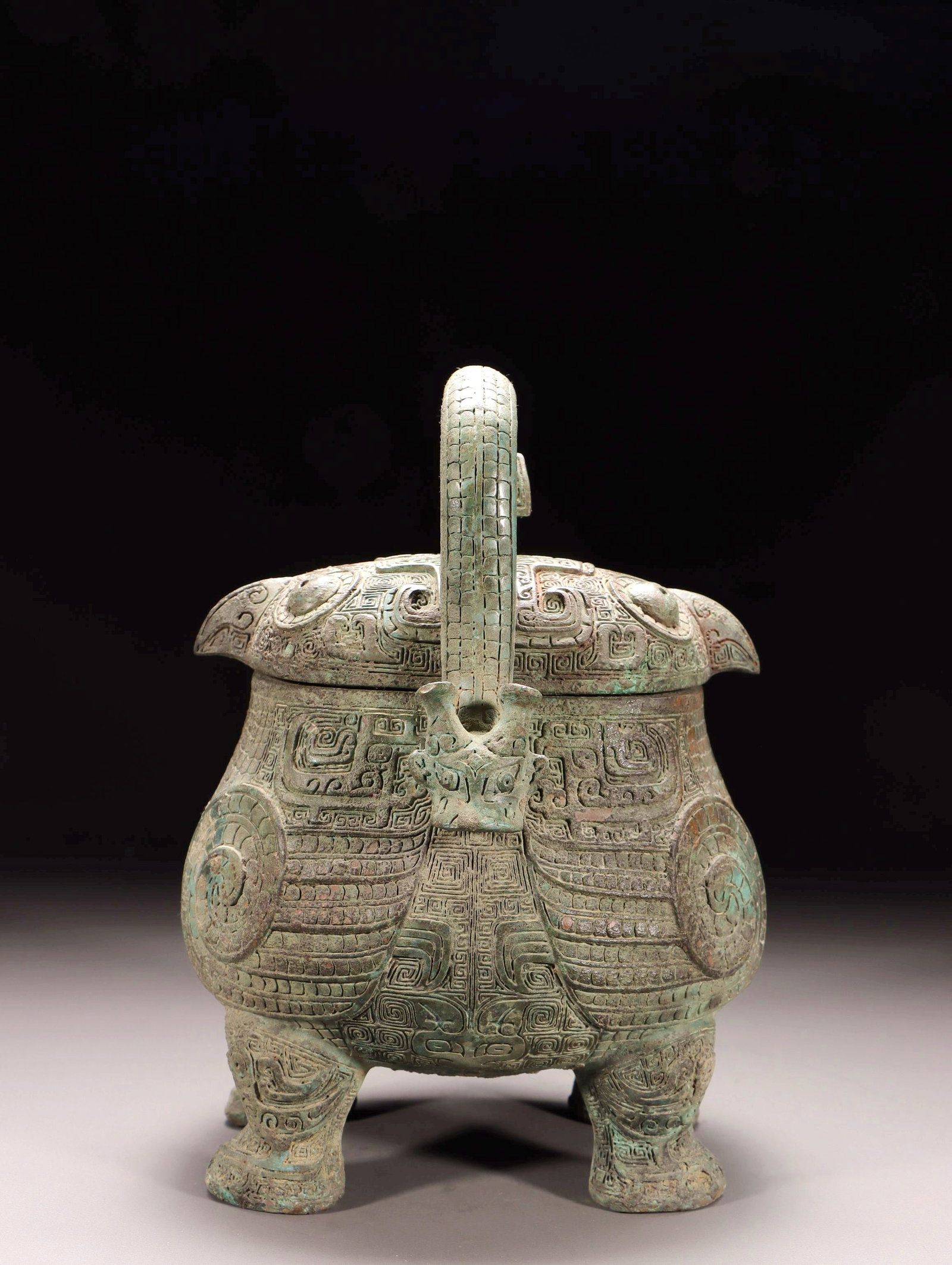 A BRONZE BIRD-SHAPED YOU VESSEL WITH LOOP HANDLE - 5