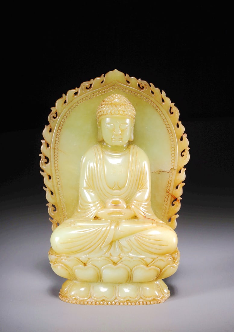 A HETIAN YELLOW JADE FIGURE OF SEATED SAKYAMUNI BUDDHA (1 of 10)