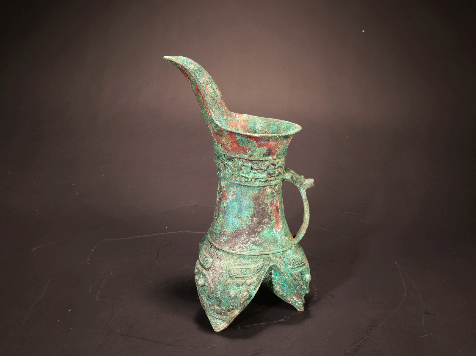 A BRONZE TRIPOD JIA VESSEL: A BRONZE TRIPOD JIA VESSEL H:22.5CM,D:8CM