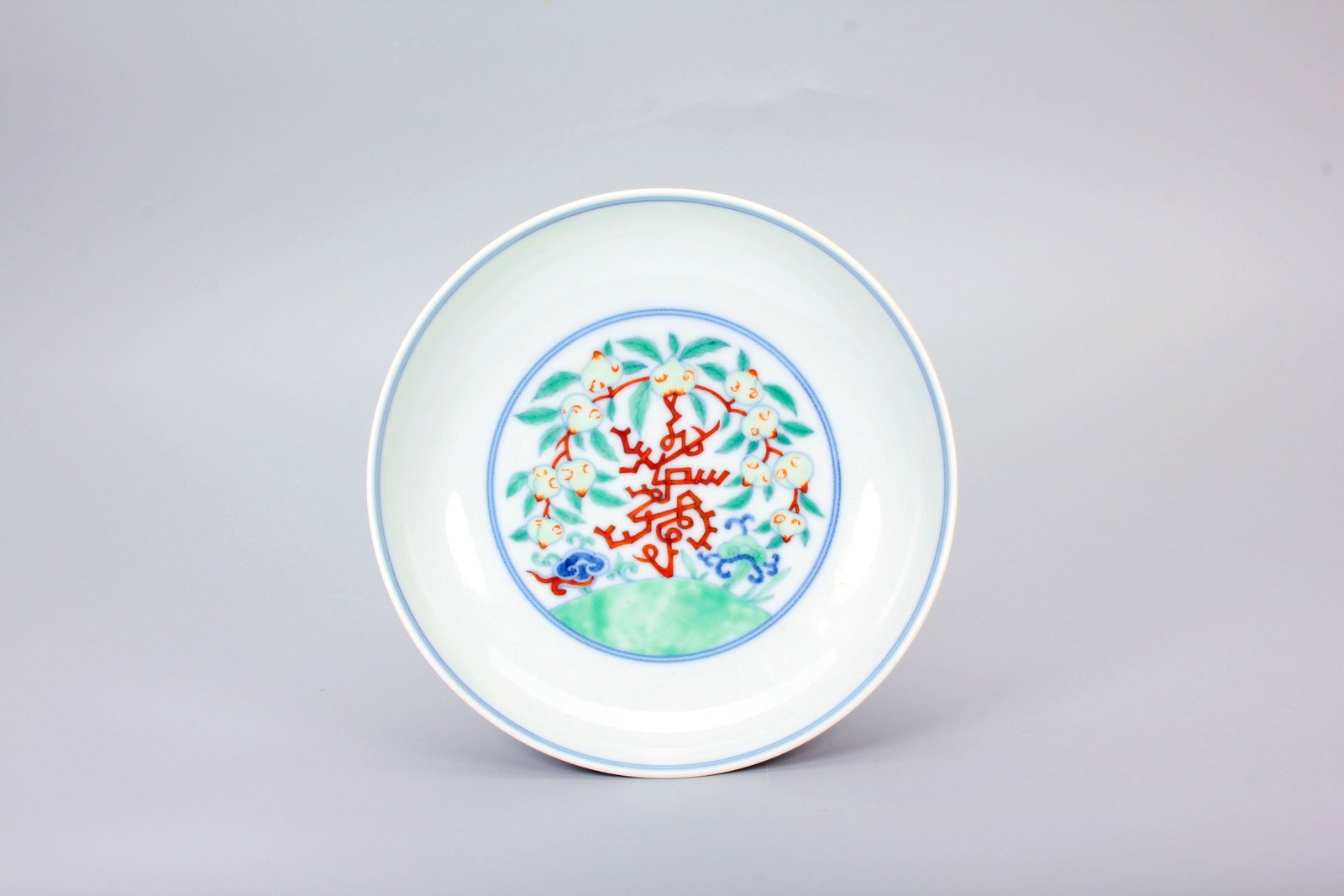 A DOUCAI PEACH AND FUNGUS LONGEVITY DISH: A DOUCAI PEACH AND FUNGUS LONGEVITY DISH H:3.6CM,D:15.1CM