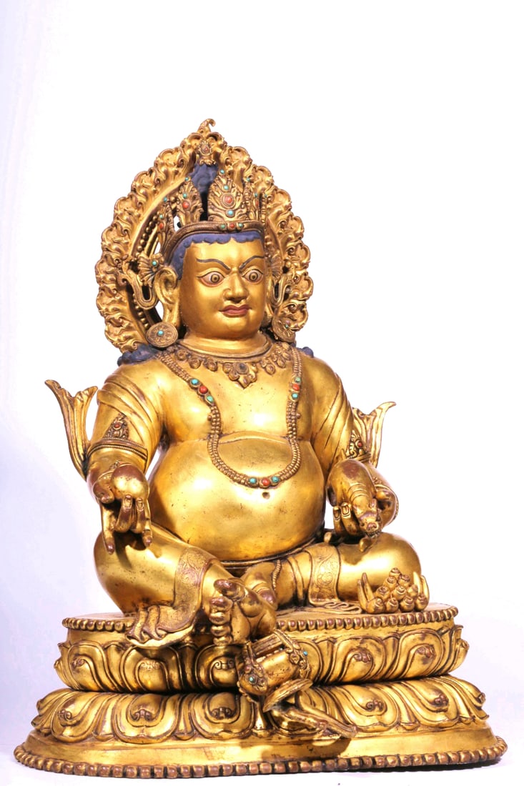 A GILT BRONZE FIGURE OF YELLOW JAMBHALA: A GILT BRONZE FIGURE OF YELLOW JAMBHALA H:49CM,L:38CM,W:29CM,15000G