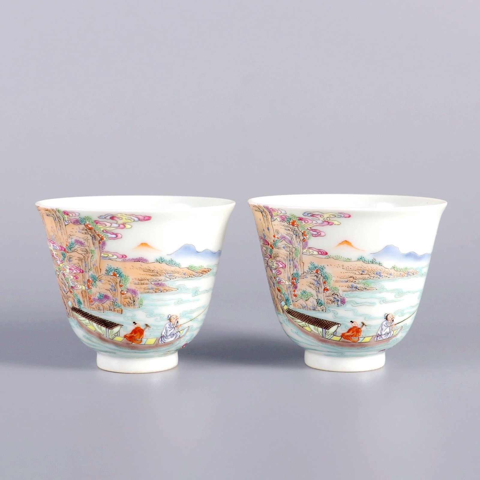 A PAIR OF FAMILLE ROSE LANDSCAPE BELL CUPS: A PAIR OF FAMILLE ROSE LANDSCAPE BELL CUPS H:5.3CM,D:6.5CM
