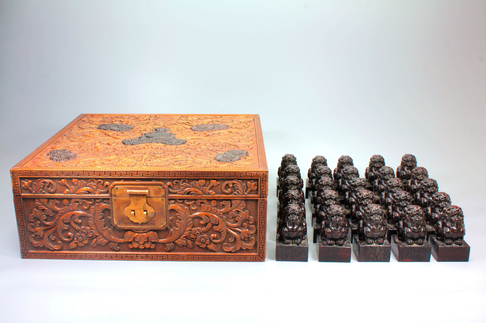 A ZITAN LION KNOB EMPEROR'S TWENTY-FIVE SEAL SET WITH HUANGHUALI FLOWER PATTERN SEAL BOX: A ZITAN LION KNOB EMPEROR'S TWENTY-FIVE SEAL SET WITH HUANGHUALI FLOWER PATTERN SEAL BOX 1.H:8CM*25;4.7*4.7CM*252.H:14CM,36*36CM