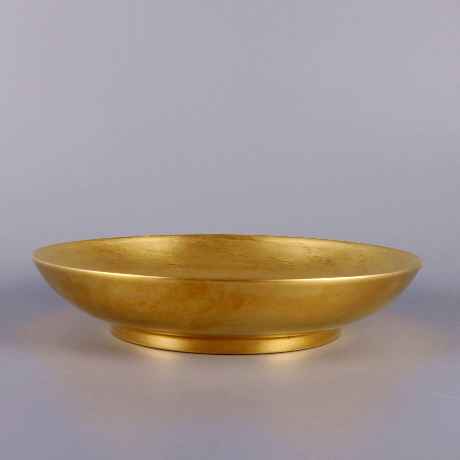 A GOLD GLAZED APPRECIATION DISH - 6
