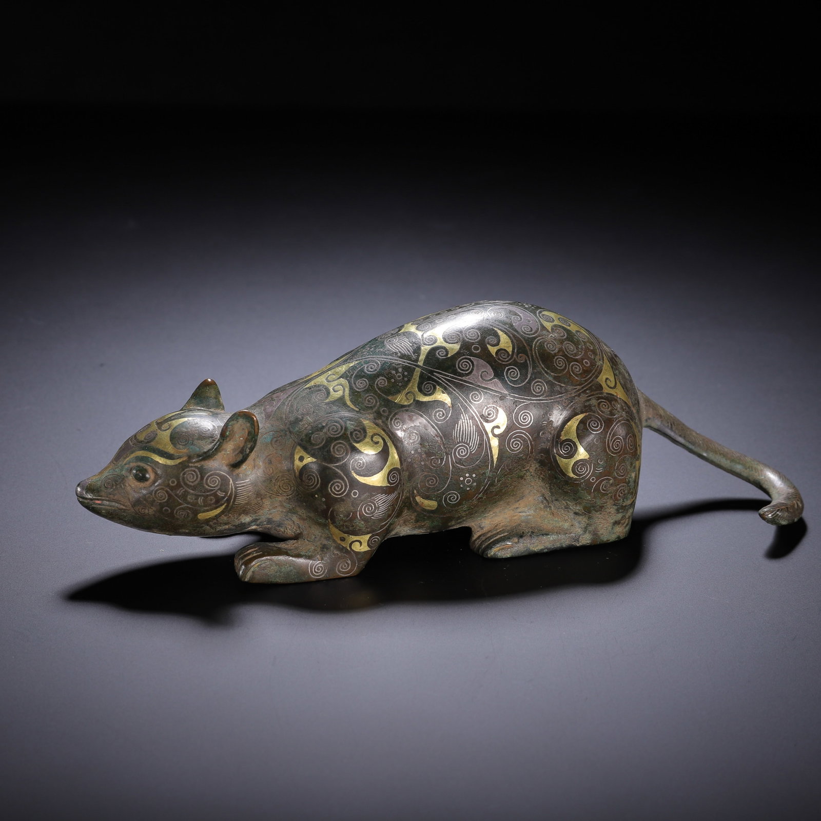 A Chinese Bronze Gold and Silver Inlaid Rat: A Chinese Bronze Gold and Silver Inlaid Rat (18cm,Weight 500g)