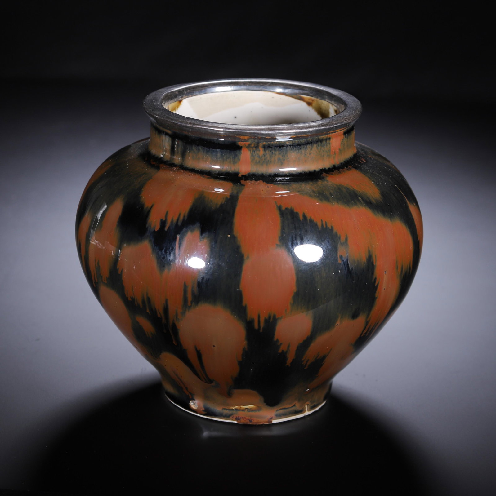 A Chinese Black and Russet Splashed Glazed Jar with Silver Rim: A Chinese Black and Russet Splashed Glazed Jar with Silver Rim (11cm,Weight 510g)