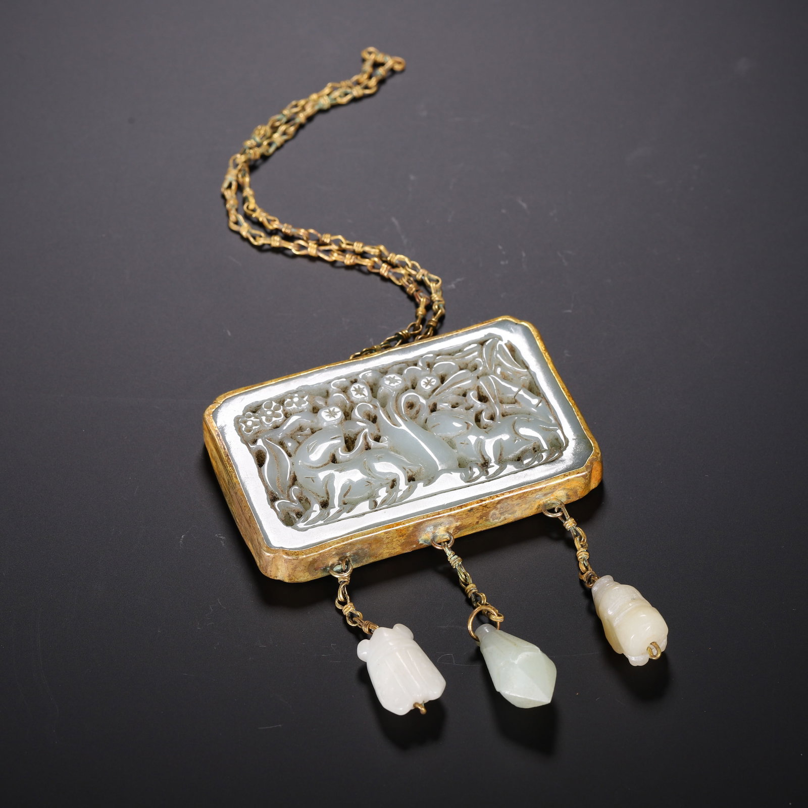 A Chinese Gilt-Silver Mounted Jade Pendant with Droplets: A Chinese Gilt-Silver Mounted Jade Pendant with Droplets (7.8 x 5cm,Weight 110g)
