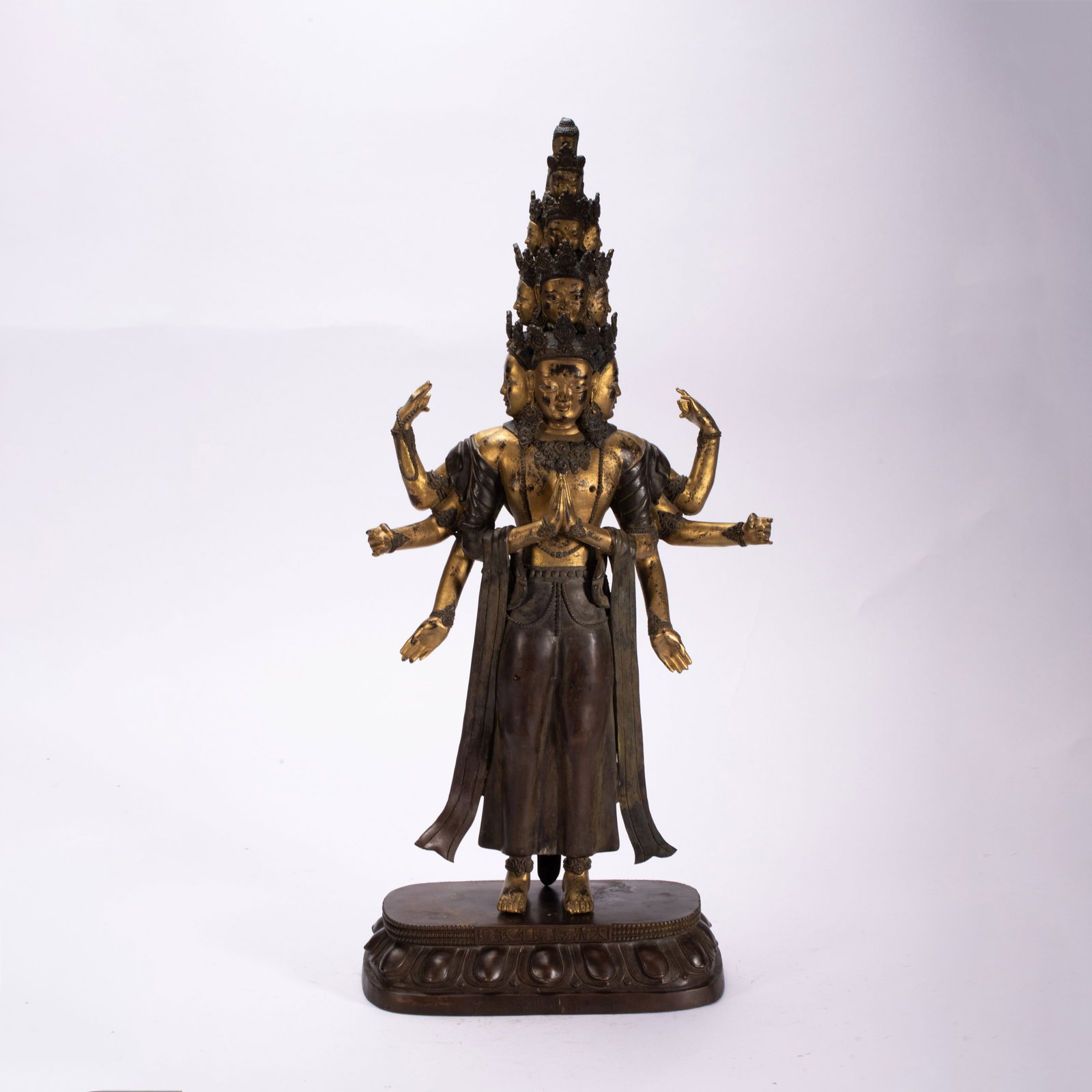 A Chinese Gilt Bronze Eleven-Headed Guanyin Statue: A Chinese Gilt Bronze Eleven-Headed Guanyin Statue (22 x 10 x 48cm,Weight 5140g)