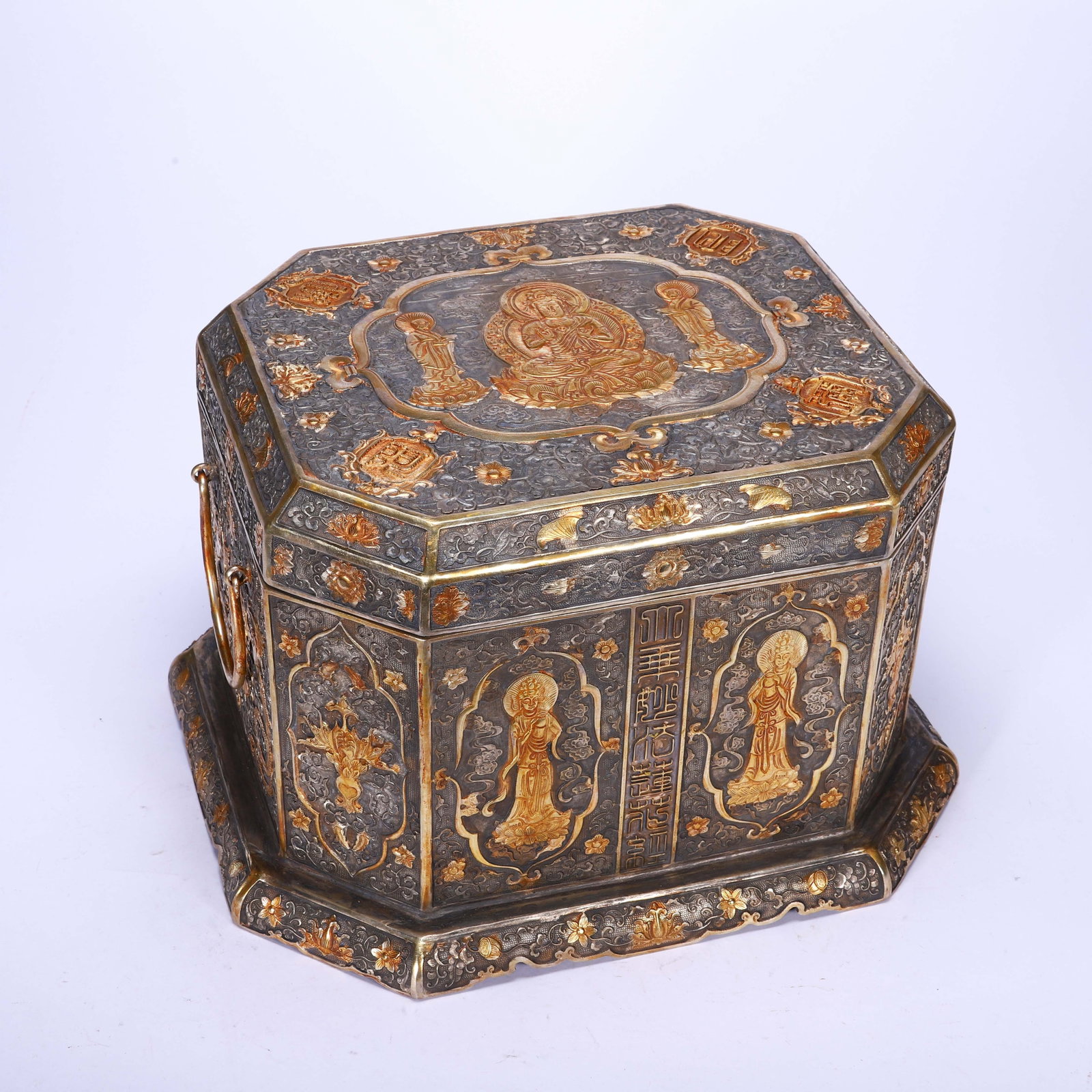 A Chinese Gilt Silver Octagonal Sutra Box: A Chinese Gilt Silver Octagonal Sutra Box (31 x 27 x 20cm)