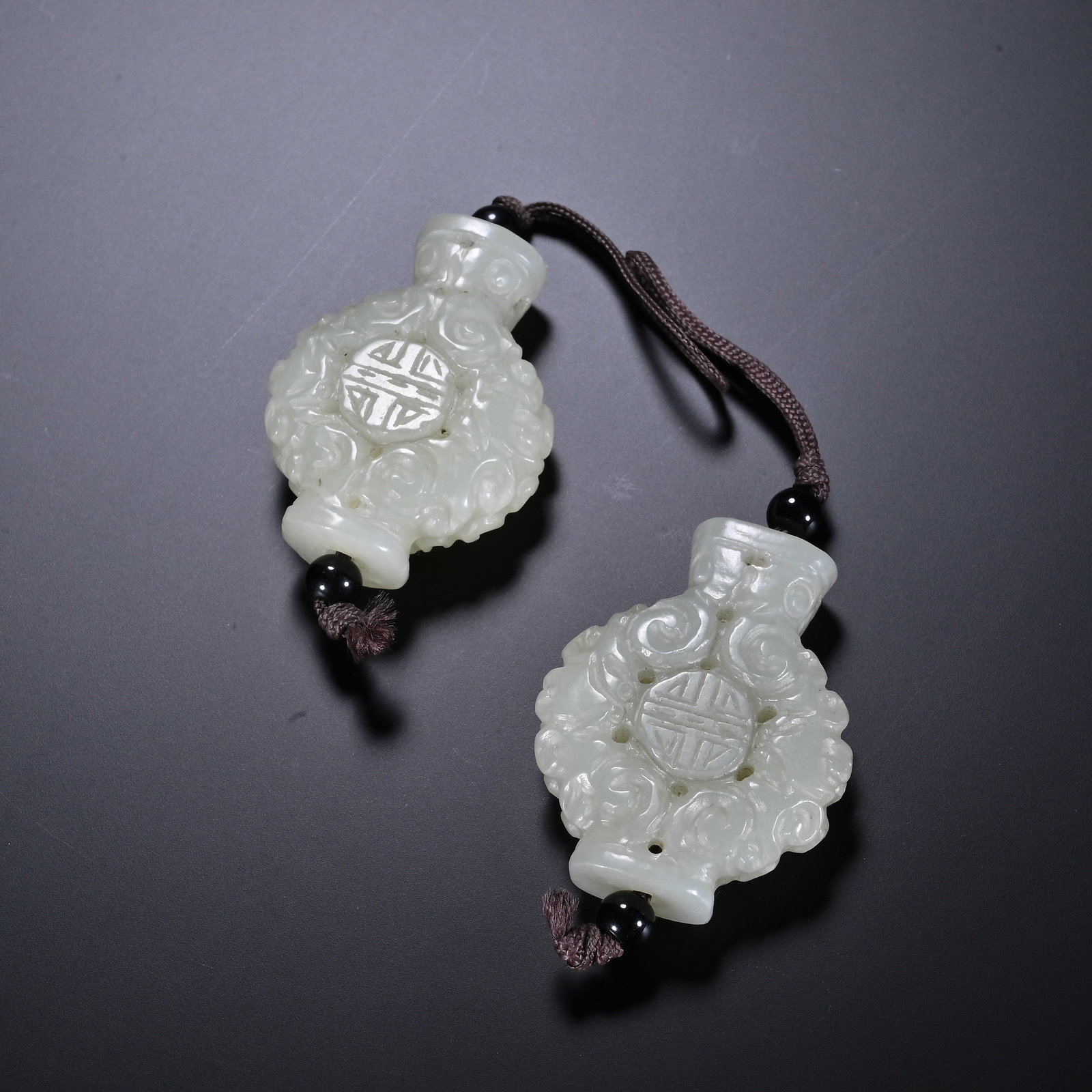 A Pair of Chinese White Jade Vase-Shaped Sachets: A Pair of Chinese White Jade Vase-Shaped Sachets (4.3 x 3.5cm)