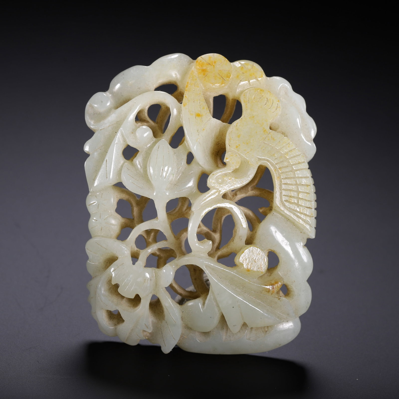 A Chinese Hetian Jade Openwork Ornament (Wa Zi): A Chinese Hetian Jade Openwork Ornament (Wa Zi) (8.6 x 6.5cm,Weight 140g)