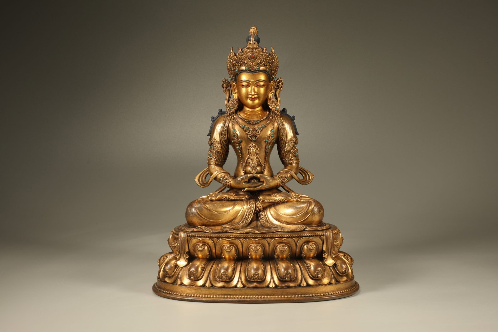 A Gilt Bronze Infinite Life Buddha Figure: A Gilt Bronze Infinite Life Buddha Figure (23.5 x 18 x 13cm)