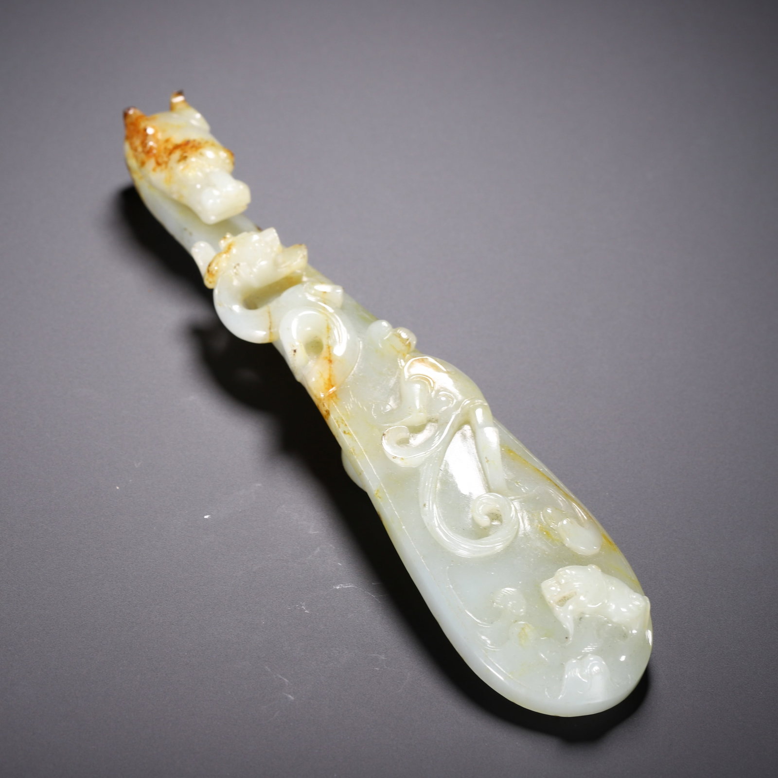 A Chinese White Jade Dragon Belt Hook: A Chinese White Jade Dragon Belt Hook (16.5cm)