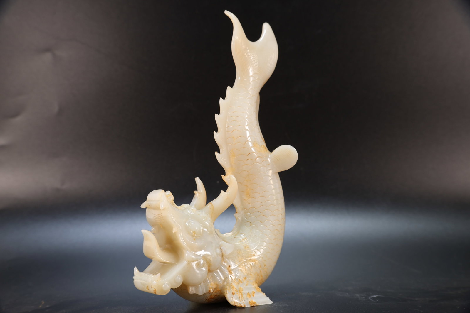 A Jade Carved Dragon Shape Ornament (1 of 14)